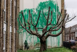 Banksy Unveils New Mural in North London, Featuring Tree Foliage