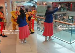 “Disgruntled Shopper Heckles Lion Dance Troupe at Plaza Singapura”